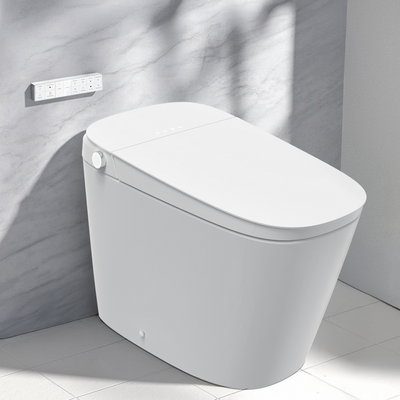 Modern white Jacuzzi toilet in a bathroom setting with tiled floor and wall.